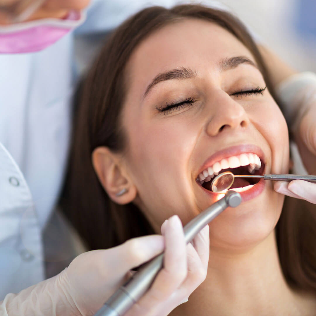 https://www.ascentdentalcare.com/wp-content/uploads/dental-patient-in-dental-chair-straight-teeth-and-good-hygiene.jpg